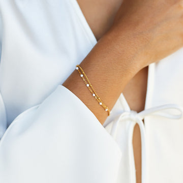 Pulsera de cuentas blancas dobles